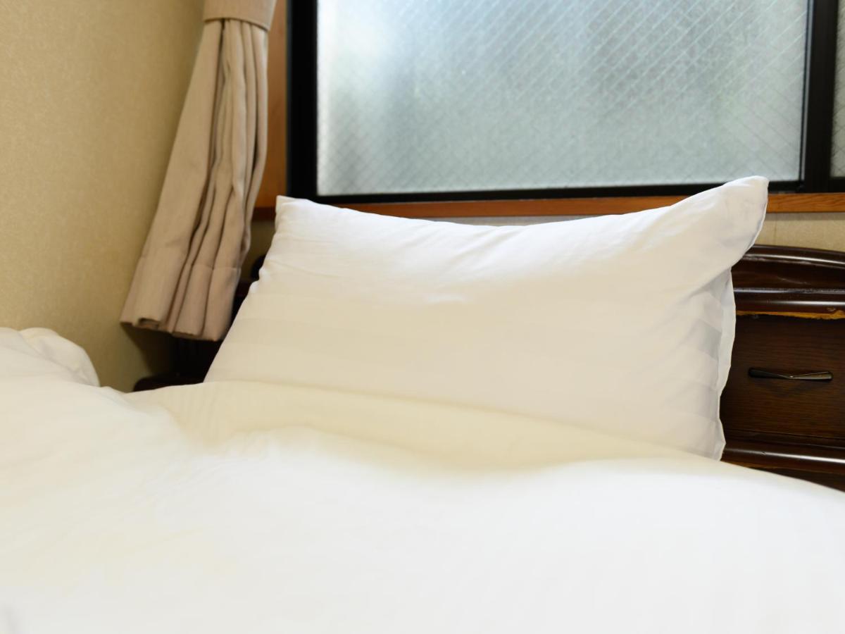 Tabist Tatsumi Business Hotel Matsusaka Bagian luar foto